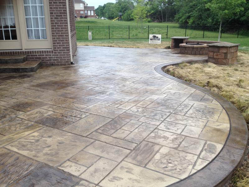 stamped concrete pattern with well and window in Tallahassee